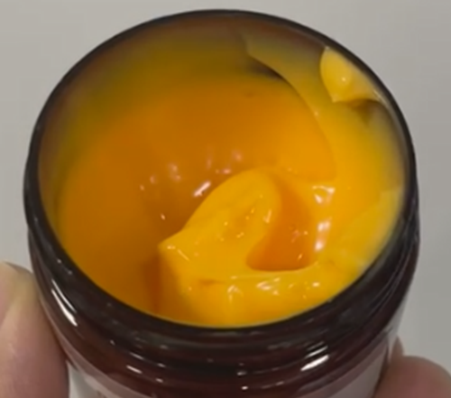 化妆品-橙黄色清香味面霜