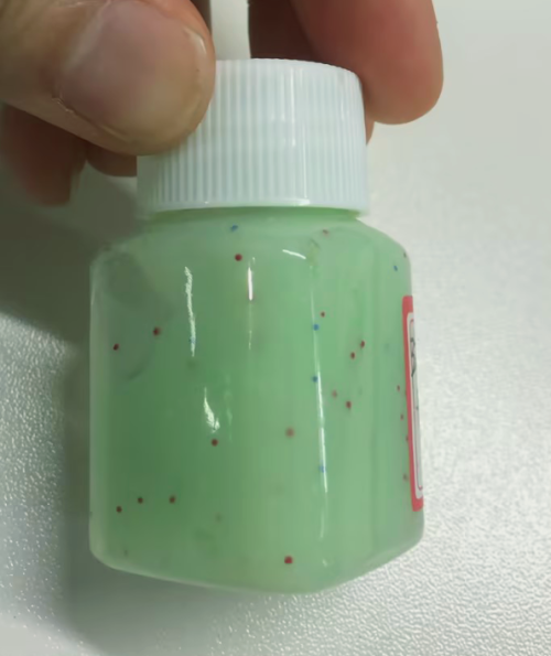 化妆品-浅绿色磨砂膏+彩色粒子