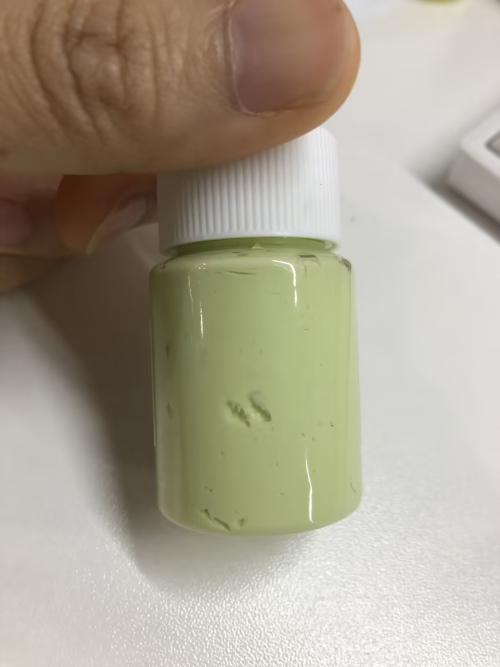 化妆品-奶绿色清香味磨砂膏