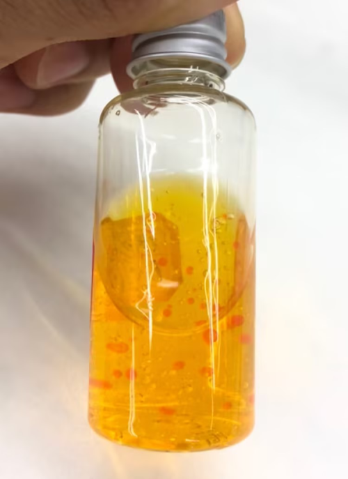 化妆品-橙色清香味精华液+橙色油珠