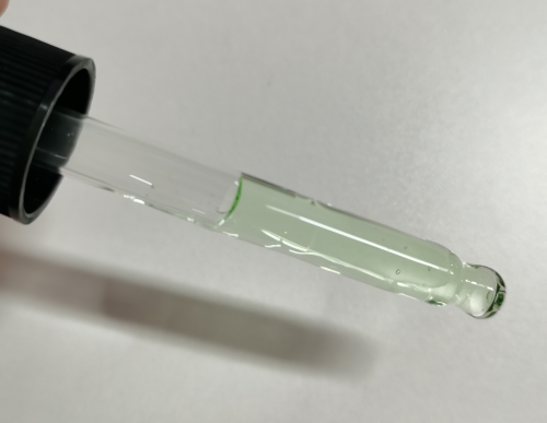 化妆品-淡绿色清香味精华液
