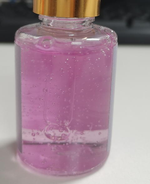 化妆品-浅紫色清香味精华液