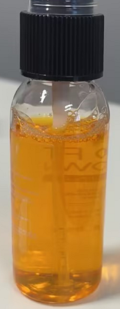 化妆品-橙色清香味美黑液