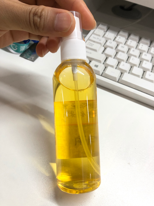 化妆品-淡金色小苍兰味生发液