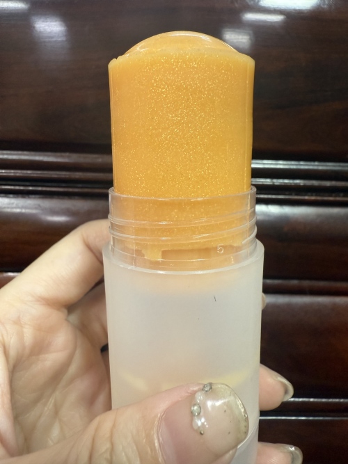 化妆品-橘色半透精华棒定制金粉加多